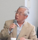 発表者の原田利彦さんの発表中の写真