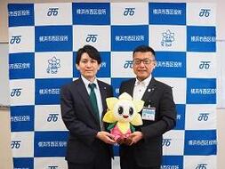 代表取締役社長との写真
