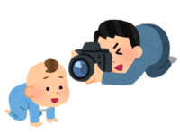 赤ちゃんの写真を撮る父親のイラスト